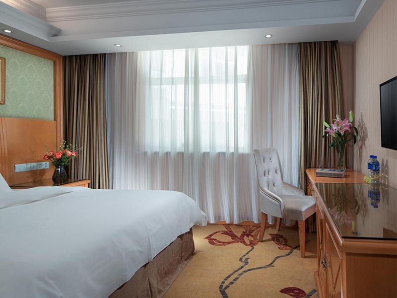 Vienna International Hotel Lijiang Yuxue Avenue Экстерьер фото