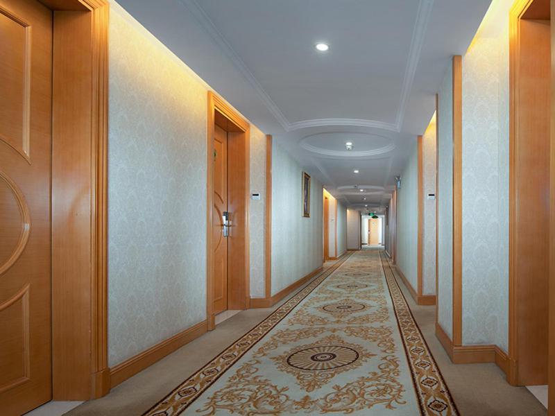 Vienna International Hotel Lijiang Yuxue Avenue Экстерьер фото