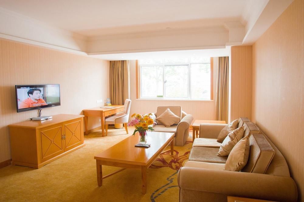 Vienna International Hotel Lijiang Yuxue Avenue Экстерьер фото